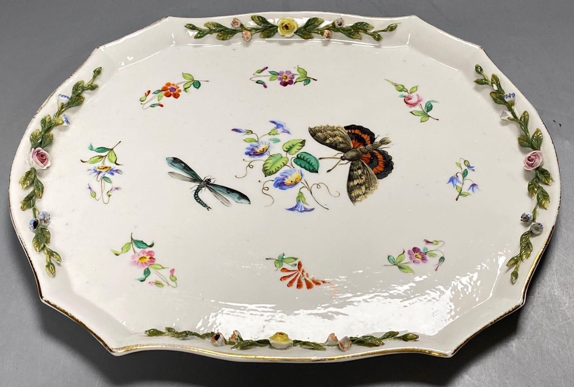 A late 19th century French porcelain flower encrusted cafe au lait set, on stand, stand 27cm